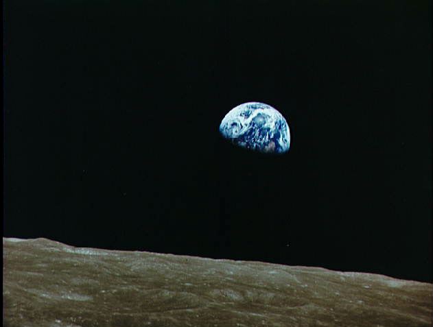 View of rising Earth about five degrees above the Lunar horizon