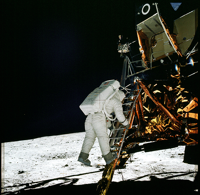  Module pilot Edwin Aldrin climbs down the ladder to the Moon's surface 