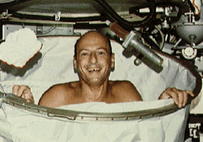 [Pete Conrad demonstrating the shower on Skylab]