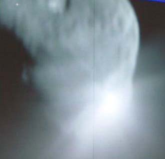 Deep Impact impactor colliding with comet Tempel 1, observed by the flyby spacecraft, NASA photo di_015.jpg