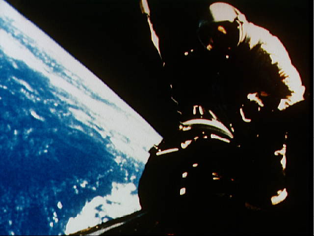 Richard Gordon performing an EVA from Gemini 11, docked with GATV-11 in the background, beyond Gemini 11's nose Source: NSSDCA Master Catalog gemini_11.jpg