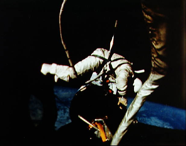 Gemini 12 astronaut Buzz Aldrin performing EVA tasks outside the capsule, NASA photo gemini_12.jpg