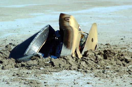 Genesis sample return capsule on the ground after impact, NASA photo Source: NASA Genesis Multimedia genesis_capsule_ground_2.jpg