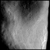 [NEAR image of asteroid Eros crater]